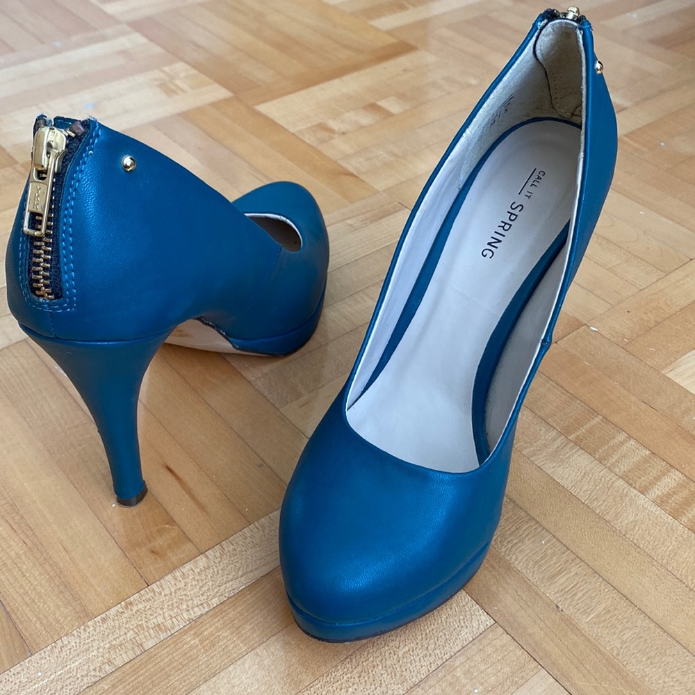 Dark teal heals, with zipper in the back. worn once. Size 7.5 (38)